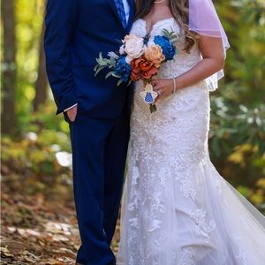 Selling my wedding dress. Originally paid $1500 and alterations were $900